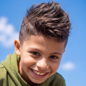 Boy with faux hawk hairstyle