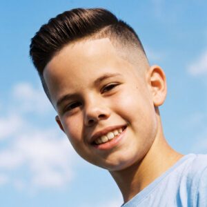 Boy with high and tight hairstyle