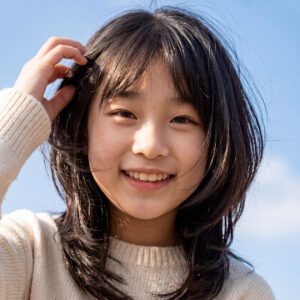 Girl with mid-length hairstyle with bangs