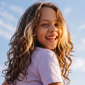 Girl with long layered haircut
