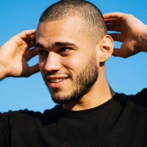 Smiling man with buzz cut