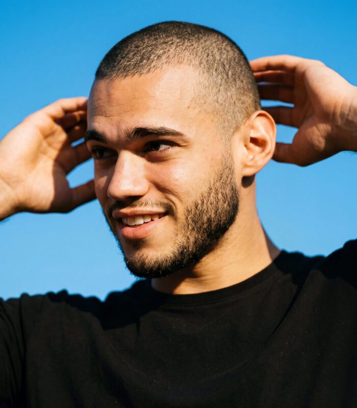 Smiling man with buzz cut