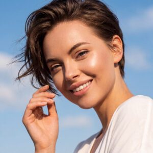 Smiling woman with pixie haircut